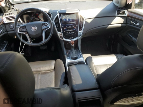 2014 Cadillac SRX Luxury Collection z VIN 3GYFNEE32ES647165, wystawiony jako Copart lot #52331335 z przebiegiem 27 277 mil mil oraz Szkoda całkowita • Salvage title. Historia ofert i sprzedaży dostępna na DreamBid. Obrazek 8.