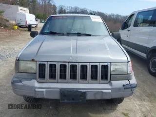 1996 Jeep Grand Cherokee Laredo with VIN 1J4EX58S1TC122268, listed as a IAAI auction lot 42005236 with 288,466 mi miles. Bid and sale history available at carsss.com. Image 6.