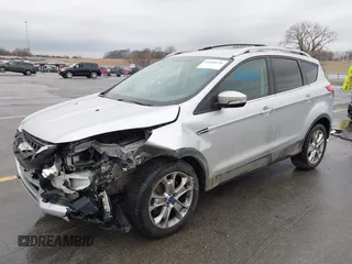 2015 Ford Escape Titanium with VIN 1FMCU9J97FUA84589, listed as a IAAI auction lot 41688156 with 129,073 mi miles. Bid and sale history available at carsss.com. Image 2.