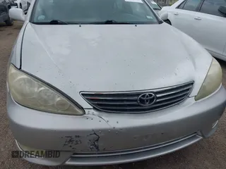 2006 Toyota Camry LE z VIN 4T1BF32K86U119208, wystawiony jako IAAI lot #42127284 z przebiegiem 99 864 mil mil oraz . Historia ofert i sprzedaży dostępna na DreamBid. Obrazek 6.