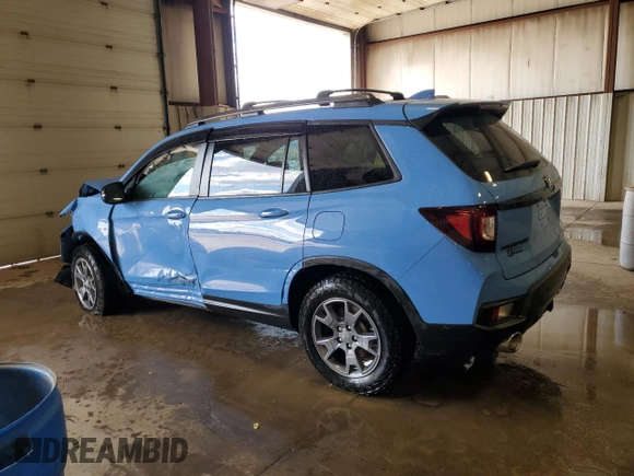 2024 Honda Passport TrailSport z VIN 5FNYF8H61RB013217, wystawiony jako Copart lot #52349015 z przebiegiem 8 360 mil mil oraz Szkoda całkowita • Salvage title. Historia ofert i sprzedaży dostępna na DreamBid. Obrazek 2.