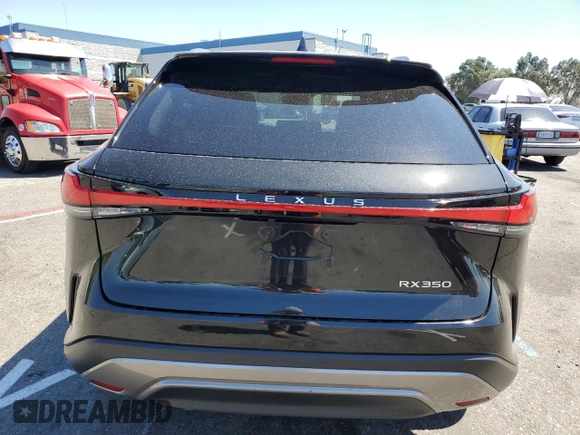2023 Lexus RX with VIN 2T2BAMBA1PC013144, listed as a Copart auction lot 64596063 with 6,809 mi miles. Bid and sale history available at carsss.com. Image 6.