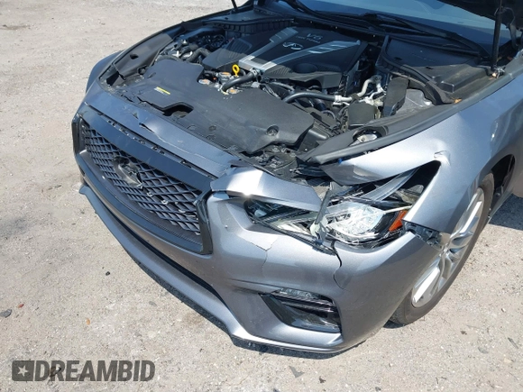 2018 Infiniti Q50 Luxe with VIN JN1EV7AP4JM590048, listed as a IAAI auction lot 41863410 with 55,727 mi miles and . Bid and sale history available at carsss.com. Image 6.