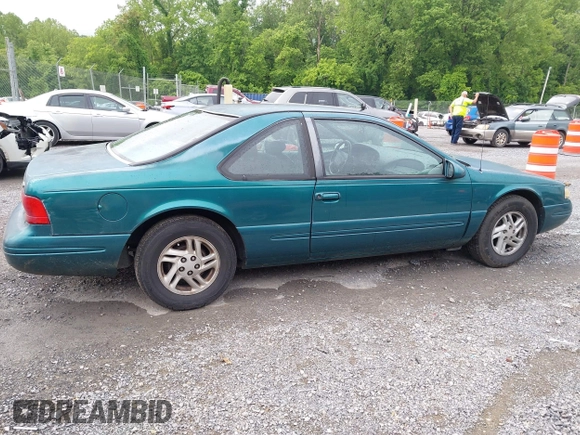 1996 Ford Thunderbird LX z VIN 1FALP62W9TH118637, wystawiony jako IAAI lot #42311641 z przebiegiem 96 361 mil mil oraz . Historia ofert i sprzedaży dostępna na DreamBid. Obrazek 13.