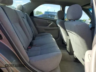 2000 Toyota Camry CE z VIN 4T1BG22K0YU692937, wystawiony jako Copart lot #57456985 z przebiegiem 116 617 mil mil oraz Szkoda całkowita • Salvage title. Historia ofert i sprzedaży dostępna na DreamBid. Obrazek 10.