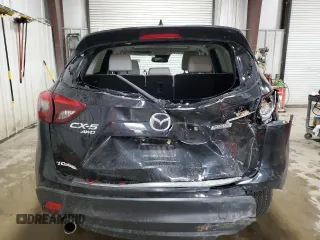 2016 Mazda CX-5 Grand Touring with VIN JM3KE4DY2G0738899, listed as a Copart auction lot 50943255 with 80,807 mi miles and Salvage Title. Bid and sale history available at carsss.com. Image 6.