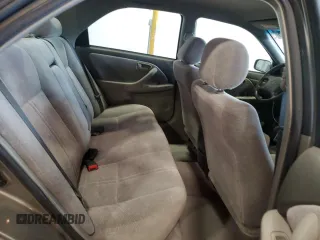 1997 Toyota Camry LE with VIN JT2BG22K8V0082736, listed as a Copart auction lot 58735955 with 54,699 mi miles and Salvage title. Bid and sale history available at DreamBid. Image 10.
