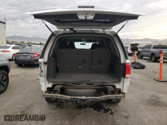2004 Ford Expedition XLS with VIN 1FMRU13W74LB40774, listed as a Copart auction lot 84467024 with 217,945 mi miles and Salvage Title. Bid and sale history available at carsss.com. Image 6.