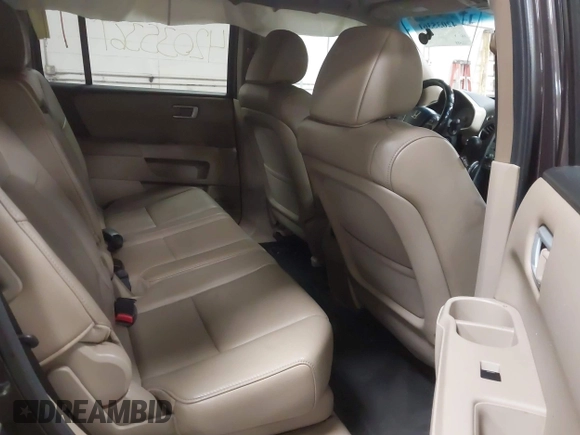 2012 Honda Pilot EX-L z VIN 5FNYF4H51CB047259, wystawiony jako IAAI lot #42035361 z przebiegiem 122 488 mil mil oraz . Historia ofert i sprzedaży dostępna na DreamBid. Obrazek 8.