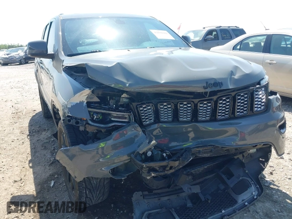 2020 Jeep Grand Cherokee Altitude with VIN 1C4RJEAG8LC391785, listed as a IAAI auction lot 42030302 with 55,622 mi miles and . Bid and sale history available at DreamBid. Image 6.