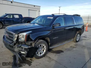 2016 GMC Yukon XL SLE with VIN 1GKS2FKC3GR180291, listed as a Copart auction lot 85600914 with 160,588 mi miles and Salvage Title. Bid and sale history available at carsss.com. Image 1.