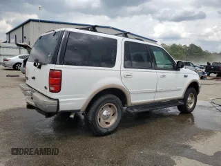 1999 Ford Expedition XLT z VIN 1FMPU18L0XLC10111, wystawiony jako Copart lot #52699205 z przebiegiem Nie podano mil oraz Szkoda całkowita • Salvage title. Historia ofert i sprzedaży dostępna na DreamBid. Obrazek 3.