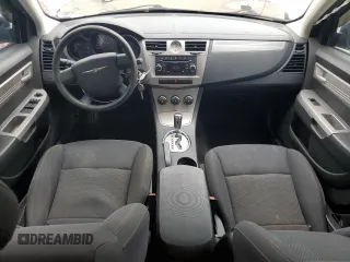 2010 Chrysler Sebring Touring z VIN 1C3CC4FB3AN203543, wystawiony jako Copart lot #57767985 z przebiegiem 152 951 mil mil oraz Szkoda całkowita • Salvage title. Historia ofert i sprzedaży dostępna na DreamBid. Obrazek 8.