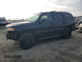 2005 GMC Yukon Denali z VIN 1GKEK63U85J262288, wystawiony jako Copart lot #49502935 z przebiegiem 133 550 mil mil oraz Szkoda całkowita • Salvage title. Historia ofert i sprzedaży dostępna na DreamBid. Obrazek 1.