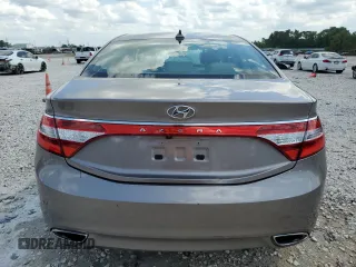 2013 Hyundai Azera с VIN KMHFG4JG0DA311156, выставлен на аукционе Copart как лот 55773825 с пробегом 87 264 миль миль и Списание • Salvage title. История ставок и продаж доступна на DreamBid. Изображение 6.