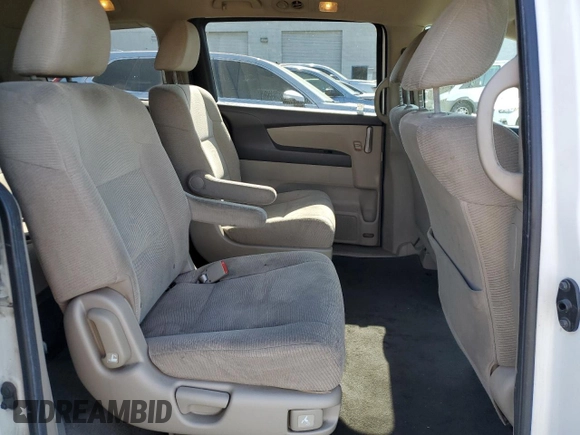 2011 Honda Odyssey LX z VIN 5FNRL5H2XBB054864, wystawiony jako Copart lot #59002395 z przebiegiem 146 987 mil mil oraz Czysty tytuł • Clean title. Historia ofert i sprzedaży dostępna na DreamBid. Obrazek 11.