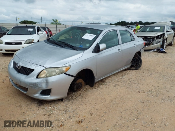 2009 Toyota Corolla with VIN 1NXBU40E49Z086415, listed as a IAAI auction lot 39773955 with 203,803 mi miles and . Bid and sale history available at DreamBid. Image 2.