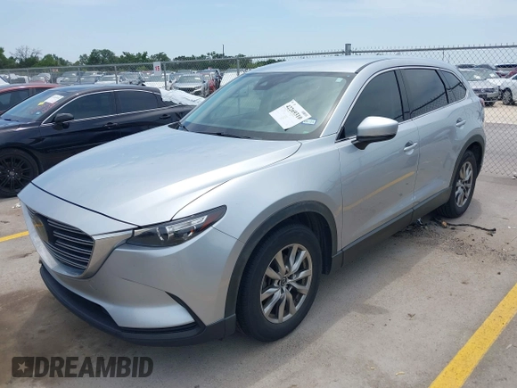 2018 Mazda CX-9 Touring with VIN JM3TCACY5J0219346, listed as a IAAI auction lot 42269310 with 93,989 mi miles and . Bid and sale history available at DreamBid. Image 17.