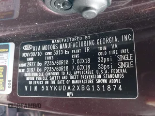 2011 Kia Sorento EX with VIN 5XYKUDA2XBG131874, listed as a IAAI auction lot 41901492 with 170,179 mi miles. Bid and sale history available at carsss.com. Image 9.