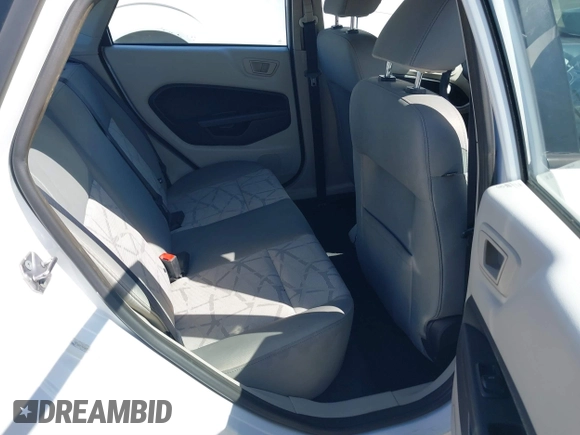 2012 Ford Fiesta SE with VIN 3FADP4BJ7CM102932, listed as a IAAI auction lot 41760394 with 70,394 mi miles and . Bid and sale history available at carsss.com. Image 8.