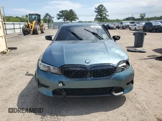 2020 BMW 3 Series 330i z VIN 3MW5R1J02L8B33169, wystawiony jako Copart lot #55660155 z przebiegiem 53 585 mil mil oraz Nie do naprawy • Non repairable. Historia ofert i sprzedaży dostępna na DreamBid. Obrazek 5.