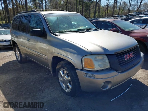 2002 GMC Envoy SLT with VIN 1GKDS13S622158143, listed as a IAAI auction lot 41886178 with 217,310 mi miles. Bid and sale history available at carsss.com. Image 1.