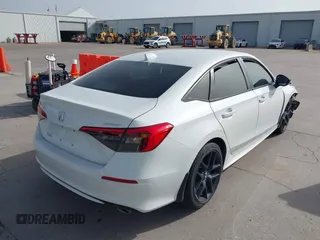 2023 Honda Civic Sport with VIN 2HGFE2F54PH521840, listed as a IAAI auction lot 42258323 with Not provided miles and . Bid and sale history available at DreamBid. Image 4.