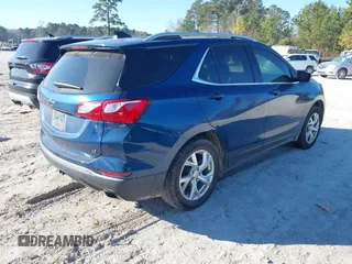 2020 Chevrolet Equinox LT with VIN 2GNAXLEX8L6103967, listed as a IAAI auction lot 41345430 with 84,218 mi miles. Bid and sale history available at carsss.com. Image 4.