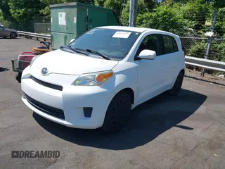 2009 Scion xD with VIN JTKKU10429J046662, listed as a IAAI auction lot 42147835 with 182,952 mi miles. Bid and sale history available at carsss.com. Image 2.