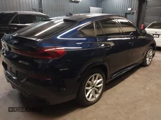 2022 BMW X6 M50i z VIN 5UXCY8C05N9J70601, wystawiony jako IAAI lot #42344397 z przebiegiem 49 085 mil mil oraz . Historia ofert i sprzedaży dostępna na DreamBid. Obrazek 4.