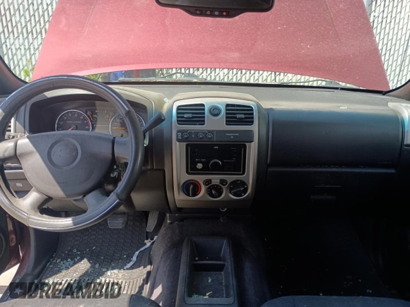 2008 Chevrolet Colorado z VIN 1GCDT43E188219182, wystawiony jako Copart lot #54735315 z przebiegiem 140 622 mil mil oraz Czysty tytuł • Clean title. Historia ofert i sprzedaży dostępna na DreamBid. Obrazek 9.