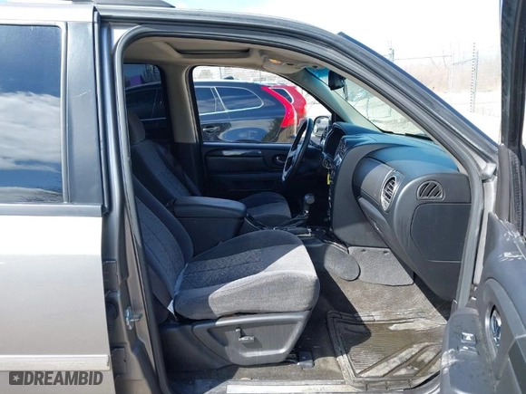 2006 GMC Envoy SLE with VIN 1GKDT13S762336273, listed as a IAAI auction lot 41887848 with 225,535 mi miles. Bid and sale history available at carsss.com. Image 5.