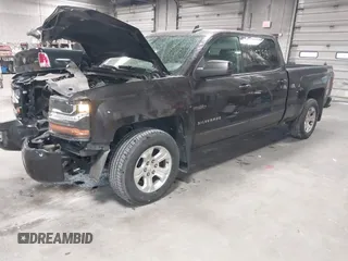 2016 Chevrolet Silverado 1500 LT with VIN 3GCUKRECXGG216804, listed as a IAAI auction lot 41825811 with 127,217 mi miles and . Bid and sale history available at DreamBid. Image 17.