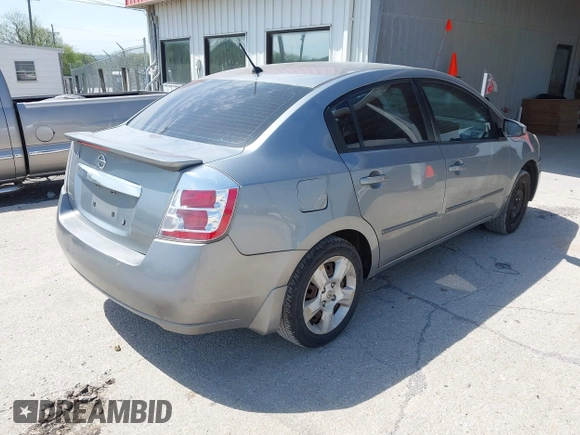 2009 Nissan Sentra S FE+ z VIN 3N1AB61E99L671293, wystawiony jako IAAI lot #42042248 z przebiegiem 126 899 mil mil oraz . Historia ofert i sprzedaży dostępna na DreamBid. Obrazek 4.