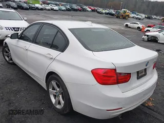 2015 BMW 3 Series 320i with VIN WBA3B1C51FP831380, listed as a IAAI auction lot 41044053 with 187,660 mi miles. Bid and sale history available at carsss.com. Image 3.