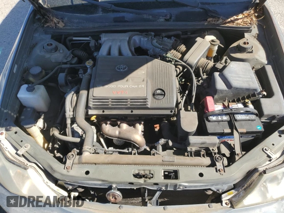 2001 Toyota Avalon XL z VIN 4T1BF28B11U154490, wystawiony jako Copart lot #49821065 z przebiegiem 197 805 mil mil oraz Szkoda całkowita • Salvage title. Historia ofert i sprzedaży dostępna na DreamBid. Obrazek 11.