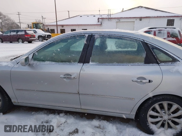 2006 Hyundai Azera SE with VIN KMHFC46F46A093575, listed as a IAAI auction lot 41259753 with 164,453 mi miles and . Bid and sale history available at DreamBid. Image 14.
