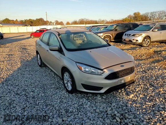 2018 Ford Focus SE z VIN 1FADP3FE8JL331853, wystawiony jako Copart lot #74013984 z przebiegiem 73 237 mil mil oraz Szkoda całkowita • Salvage title. Historia ofert i sprzedaży dostępna na DreamBid. Obrazek 11.