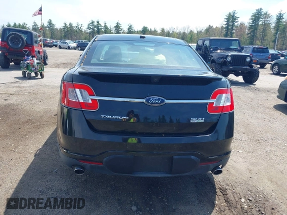 2011 Ford Taurus SHO z VIN 1FAHP2KT7BG188095, wystawiony jako IAAI lot #42180454 z przebiegiem 161 656 mil mil oraz . Historia ofert i sprzedaży dostępna na DreamBid. Obrazek 12.