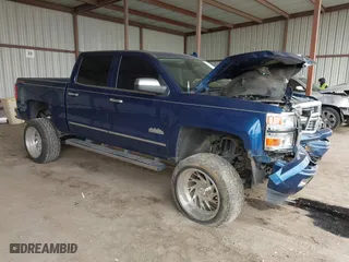 2015 Chevrolet Silverado 1500 High Country with VIN 3GCUKTEJ0FG491799, listed as a IAAI auction lot 41615824 with 118,745 mi miles. Bid and sale history available at carsss.com. Image 1.