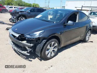 2024 Tesla Model Y with VIN 7SAYGDED2RF040745, listed as a IAAI auction lot 41986613 with 9,778 mi miles and . Bid and sale history available at DreamBid. Image 21.
