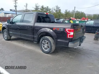 2019 Ford F-150 XL with VIN 1FTFW1E13KFC63843, listed as a IAAI auction lot 41682862 with 102,390 mi miles. Bid and sale history available at carsss.com. Image 3.