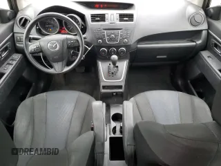 2015 Mazda 5 Sport with VIN JM1CW2BLXF0184094, listed as a Copart auction lot 56618405 with 98,757 mi miles and Salvage title. Bid and sale history available at DreamBid. Image 8.