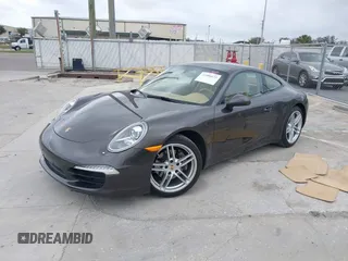 2013 Porsche 911 Carrera with VIN WP0AA2A91DS106624, listed as a IAAI auction lot 41586673 with 37,100 mi miles. Bid and sale history available at carsss.com. Image 2.