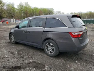 2012 Honda Odyssey EX-L with VIN 5FNRL5H62CB079729, listed as a Copart auction lot 52068685 with 181,468 mi miles and Salvage Title. Bid and sale history available at carsss.com. Image 2.