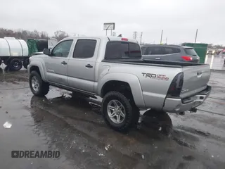 2014 Toyota Tacoma with VIN 3TMLU4EN2EM161239, listed as a IAAI auction lot 41536944 with 136,299 mi miles. Bid and sale history available at carsss.com. Image 3.