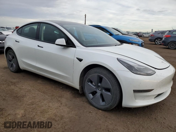 2023 Tesla Model 3 with VIN 5YJ3E1EA5PF484801, listed as a Copart auction lot 79766274 with 83,541 mi miles and Clean Title. Bid and sale history available at DreamBid. Image 4.