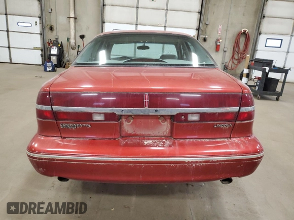 1997 Lincoln Continental with VIN 1LNLM97V9VY616128, listed as a Copart auction lot 48687805 with 61,591 mi miles and Salvage Title. Bid and sale history available at carsss.com. Image 6.
