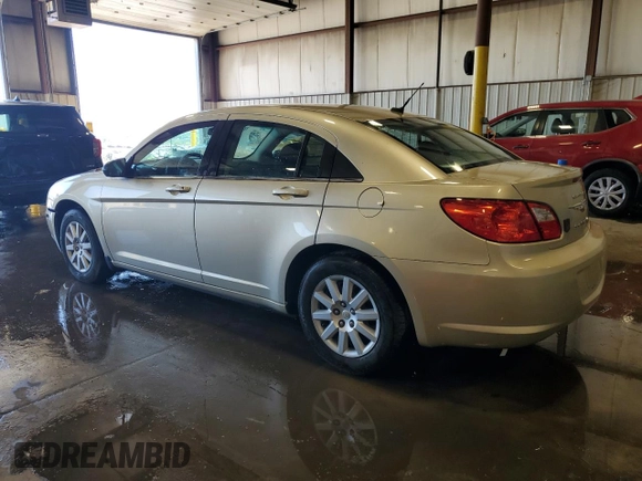 2010 Chrysler Sebring Touring with VIN 1C3CC4FB2AN183821, listed as a Copart auction lot 55239615 with 26,094 mi miles and Salvage Title. Bid and sale history available at DreamBid. Image 2.