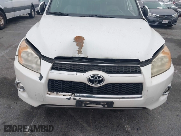 2010 Toyota RAV4 Limited with VIN JTMYF4DV7A5031877, listed as a IAAI auction lot 42382323 with 205,957 mi miles and . Bid and sale history available at DreamBid. Image 6.